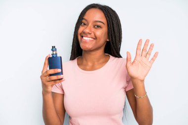 black pretty woman smiling happily, waving hand, welcoming and greeting you. smoker vaper concept