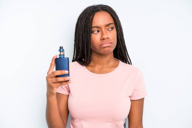 black pretty woman feeling sad, upset or angry and looking to the side. smoker vaper concept