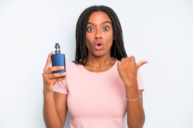 black pretty woman looking astonished in disbelief. smoker vaper concept