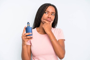 black pretty woman thinking, feeling doubtful and confused. smoker vaper concept