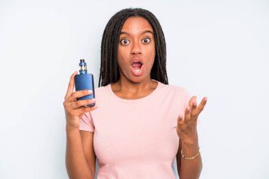 black pretty woman feeling extremely shocked and surprised. smoker vaper concept