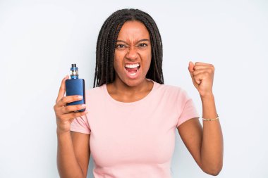 black pretty woman shouting aggressively with an angry expression. smoker vaper concept