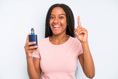 black pretty woman feeling like a happy and excited genius after realizing an idea. smoker vaper concept