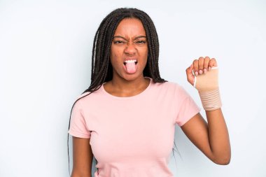 black pretty woman feeling disgusted and irritated and tongue out. broken hand concept