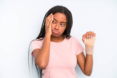 black pretty woman feeling bored, frustrated and sleepy after a tiresome. broken hand concept