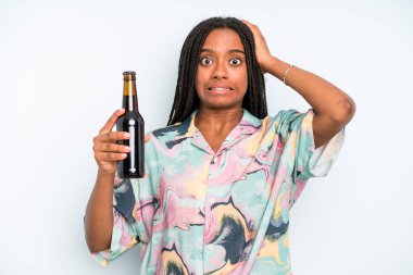black pretty woman feeling stressed, anxious or scared, with hands on head beer and holidays concept