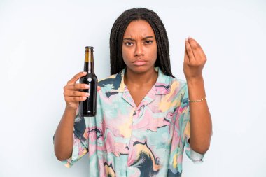 black pretty woman making capice or money gesture, telling you to pay beer and holidays concept