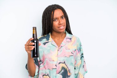 black pretty woman feeling puzzled and confused beer and holidays concept