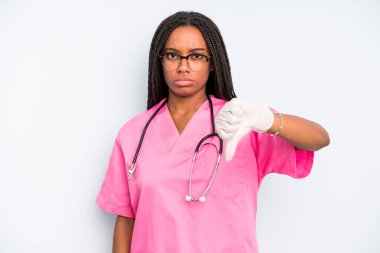 black pretty woman feeling cross,showing thumbs down. nurse concept