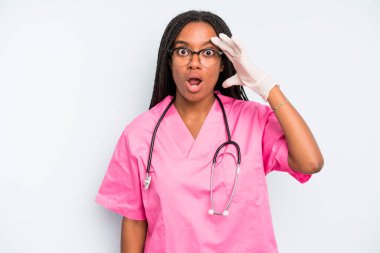 black pretty woman looking happy, astonished and surprised. nurse concept
