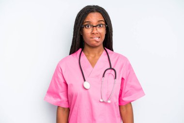 black pretty woman looking puzzled and confused. nurse concept