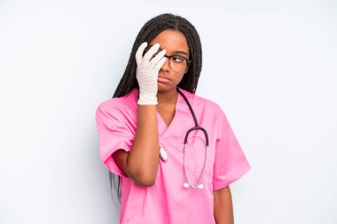 black pretty woman feeling bored, frustrated and sleepy after a tiresome. nurse concept