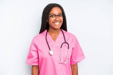 black pretty woman looking happy and pleasantly surprised. nurse concept