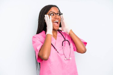 black pretty woman feeling happy, excited and surprised. nurse concept