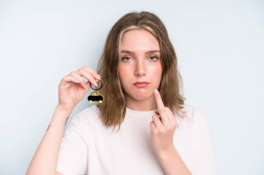 caucasian pretty woman feeling angry, annoyed, rebellious and aggressive. new car concept