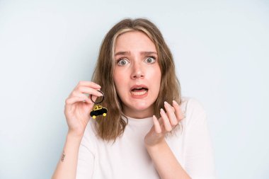 caucasian pretty woman looking desperate, frustrated and stressed. new car concept