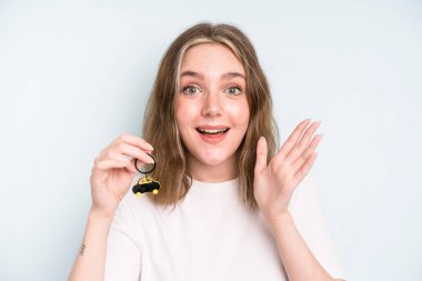 caucasian pretty woman feeling happy, surprised realizing a solution or idea. new car concept