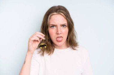 caucasian pretty woman feeling disgusted and irritated and tongue out. new car concept
