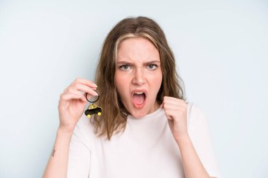 caucasian pretty woman shouting aggressively with an angry expression. new car concept