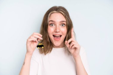 caucasian pretty woman feeling like a happy and excited genius after realizing an idea. new car concept