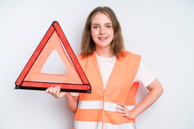 caucasian pretty woman smiling happily with a hand on hip and confident. car emergency concept