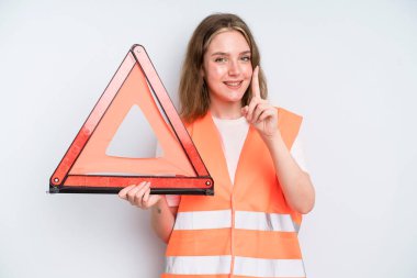 caucasian pretty woman smiling proudly and confidently making number one. car emergency concept