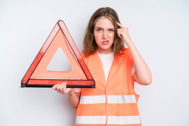 caucasian pretty woman feeling confused and puzzled, showing you are insane. car emergency concept