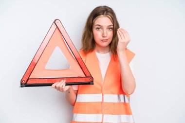caucasian pretty woman making capice or money gesture, telling you to pay. car emergency concept