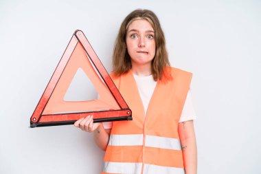 caucasian pretty woman looking puzzled and confused. car emergency concept