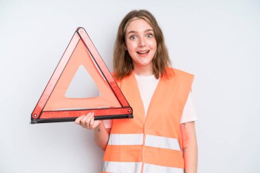 caucasian pretty woman looking happy and pleasantly surprised. car emergency concept