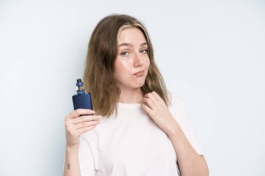 caucasian pretty woman looking arrogant, successful, positive and proud. smoker with a vaper concept