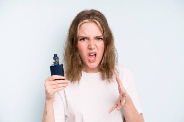 caucasian pretty woman looking angry, annoyed and frustrated. smoker with a vaper concept