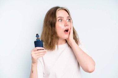 caucasian pretty woman feeling happy, excited and surprised. smoker with a vaper concept