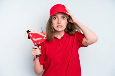 caucasian pretty woman feeling stressed, anxious or scared, with hands on head. employee concept