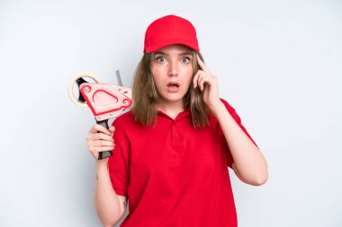 caucasian pretty woman looking surprised, realizing a new thought, idea or concept. employee concept