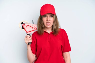 caucasian pretty woman feeling disgusted and irritated and tongue out. employee concept