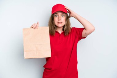 caucasian pretty woman feeling stressed, anxious or scared, with hands on head. delivery and take away concept