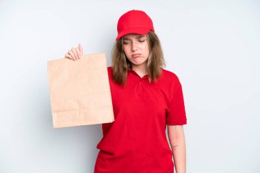 caucasian pretty woman feeling sad, upset or angry and looking to the side. delivery and take away concept