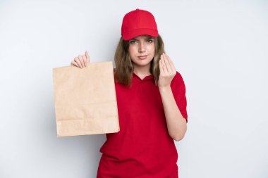 caucasian pretty woman making capice or money gesture, telling you to pay. delivery and take away concept