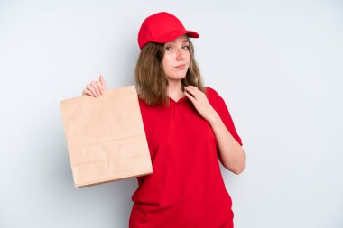 caucasian pretty woman looking arrogant, successful, positive and proud. delivery and take away concept