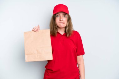 caucasian pretty woman looking puzzled and confused. delivery and take away concept