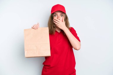 caucasian pretty woman covering mouth with hands with a shocked. delivery and take away concept