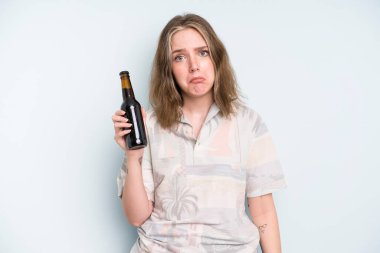 caucasian pretty woman feeling sad and whiney with an unhappy look and crying. beer concept