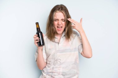 caucasian pretty woman looking unhappy and stressed, suicide gesture making gun sign. beer concept
