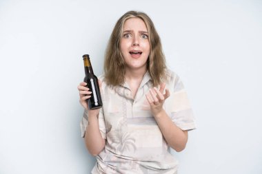 caucasian pretty woman looking desperate, frustrated and stressed. beer concept