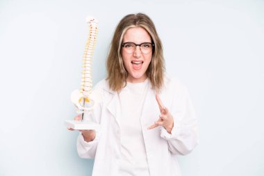 caucasian pretty woman looking angry, annoyed and frustrated. spine specialist concept