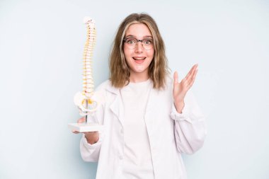 caucasian pretty woman feeling happy, surprised realizing a solution or idea. spine specialist concept