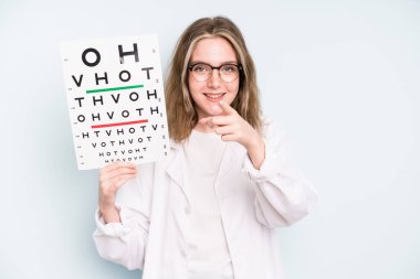 caucasian pretty woman laughing out loud at some hilarious joke. optical vision test concept