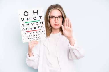 caucasian pretty woman feeling proud,smiling positively with thumbs up. optical vision test concept