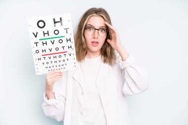 caucasian pretty woman feeling stressed, anxious or scared, with hands on head. optical vision test concept